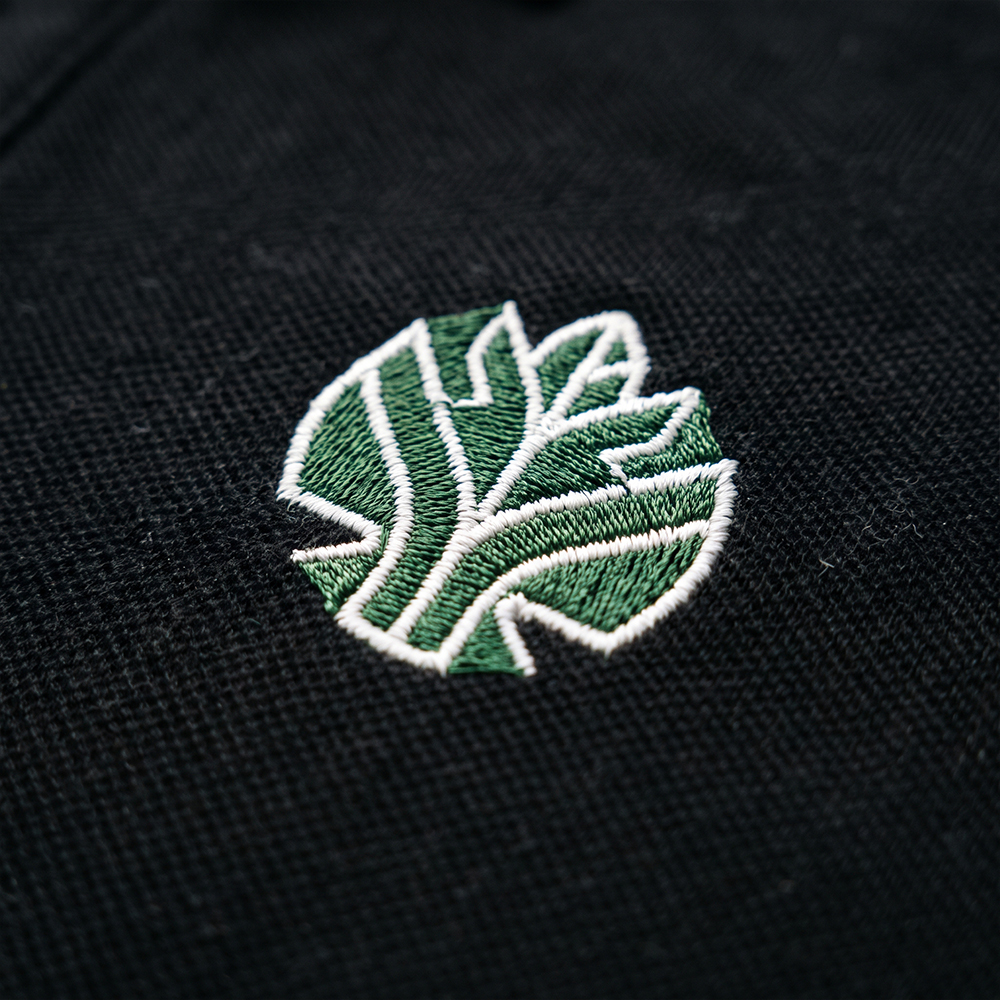 Apparel pieces laid out for colour and branding review